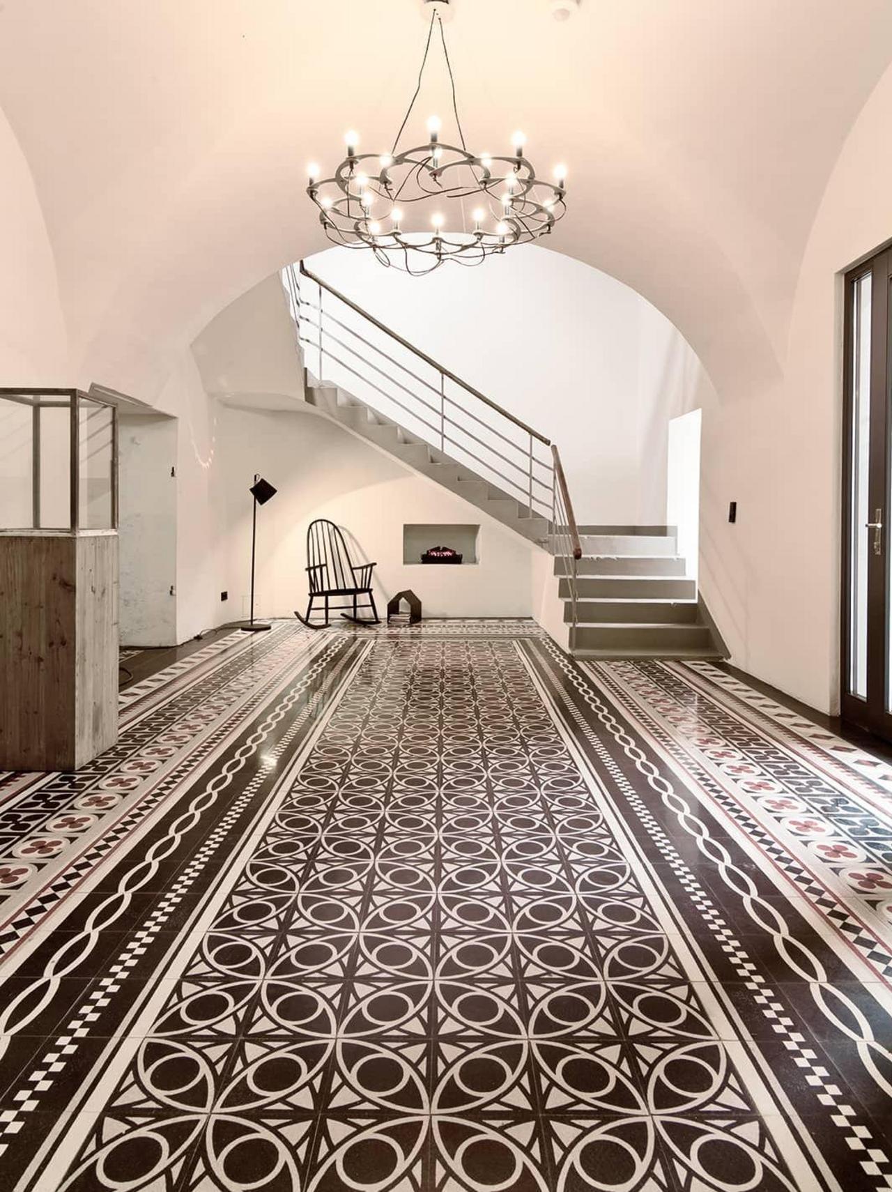 Impressive entrance and reception area with black and white VIA terrazzo tiles 