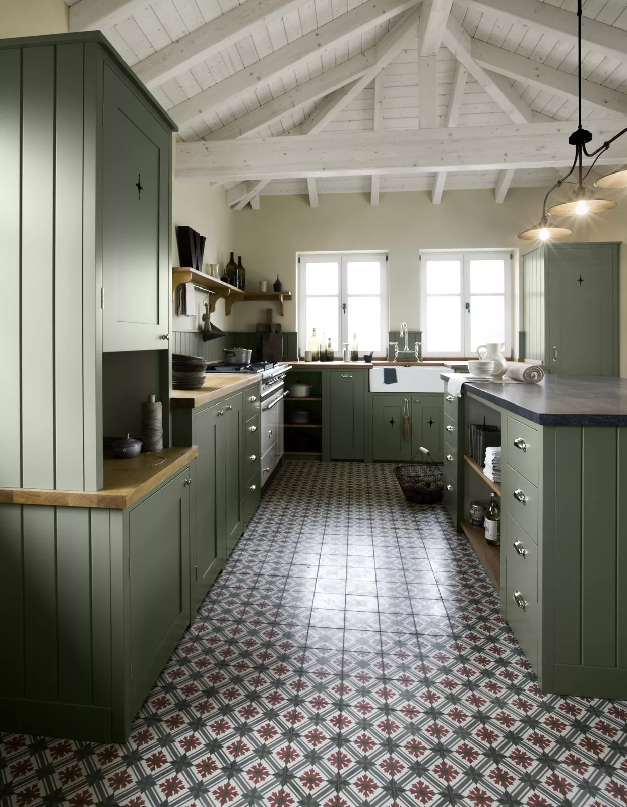 Zementfliesen in grüner Küche