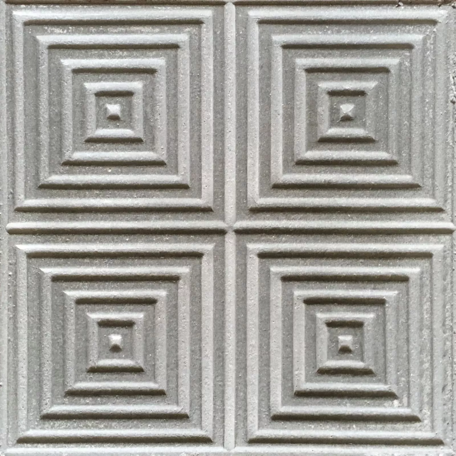 geriffelte Trottoirplatte mit vierteiligem Muster