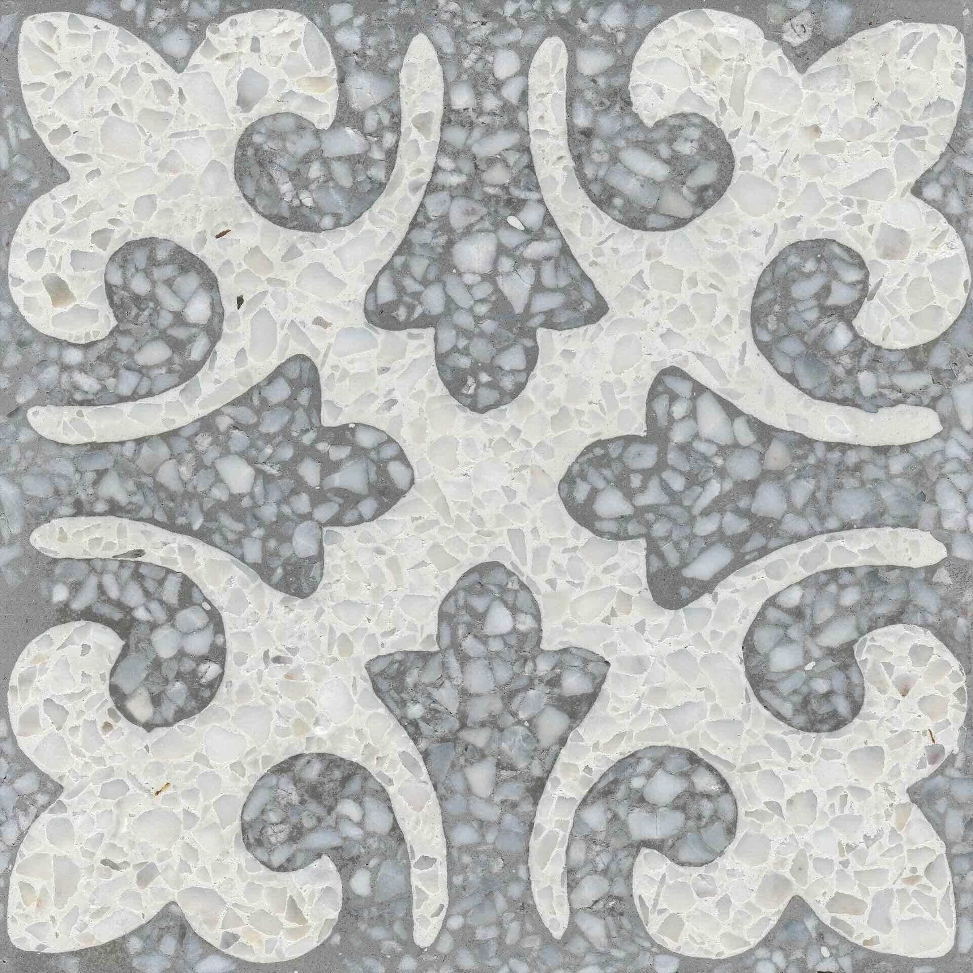 Detailansicht der VIA Terrazzoplatte 911054 mit floralem Muster in Weiß und grauem Naturstein