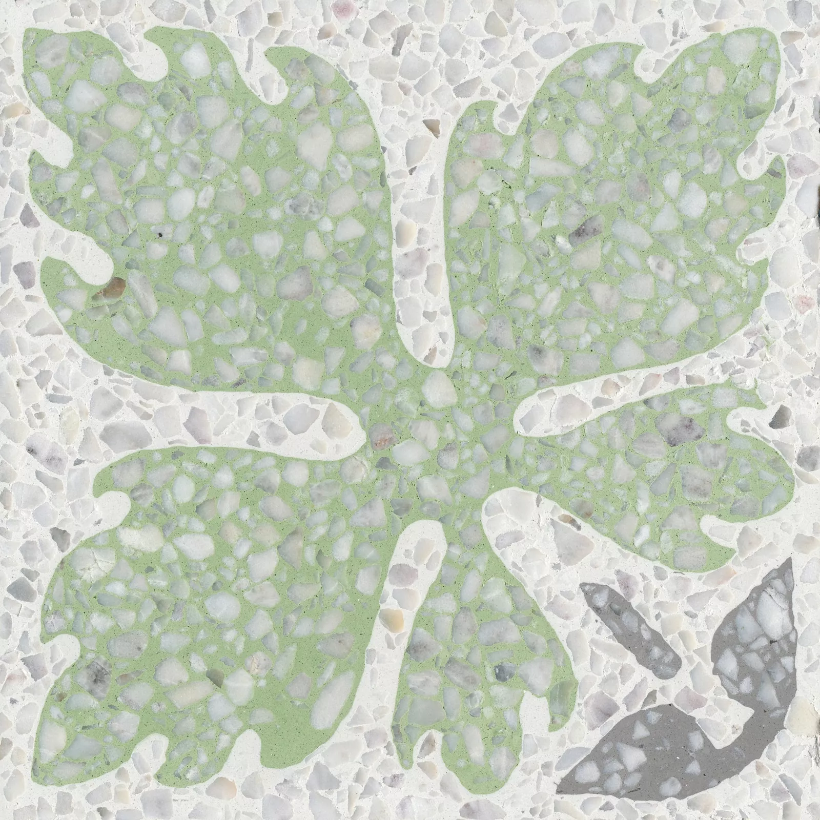 VIA Terrazzoplatte grob mit einem grünen Blatt